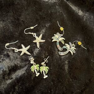 Pierced earrings. Beach. Palm trees and starfish.